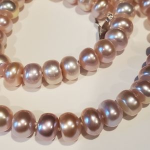 Light pink pearl necklace.